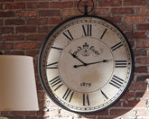 Warmstead Furniture - Ashley Furniture - Augustina Wall Decor - Wall Clock / Antique Black - A8010110