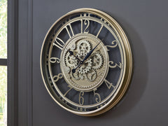 Warmstead Furniture - Ashley Furniture - Gilover Wall Decor - Wall Clock / Champagne Finish - A8010386