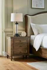 Warmstead Furniture - Ashley Furniture - Sturlayne Bedroom - King Upholstered Panel Bed / Brown - B787B4