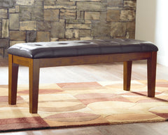 Warmstead Furniture - Ashley Furniture - Ralene Dining Bench - Large UPH Dining Room Bench / Medium Brown / 50"W x 16"D x 19"H - D594-00
