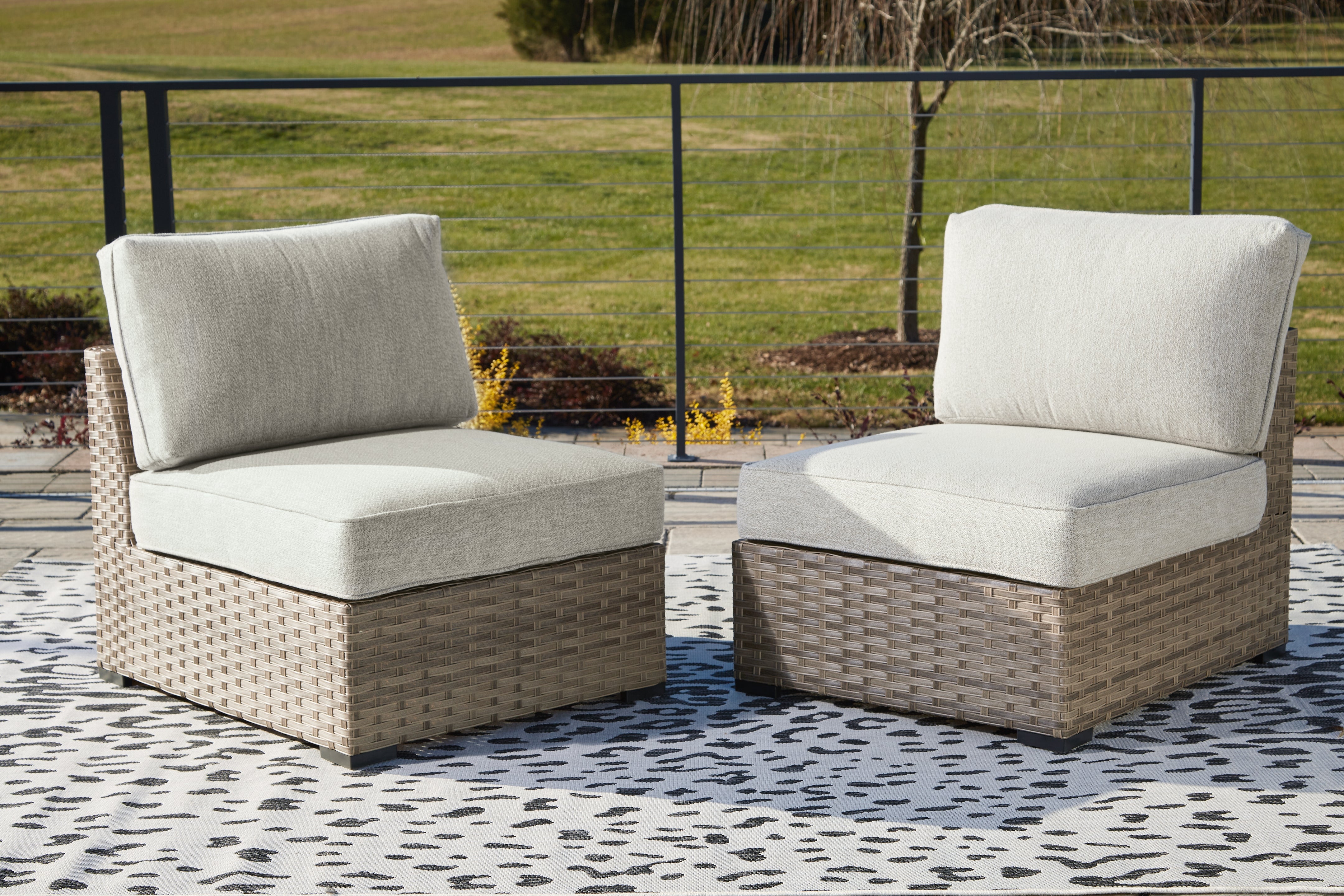 Warmstead Furniture - Ashley Furniture - Calworth Outdoor - Armless Chair w/Cushion (Set of 2) / Beige - P458-846