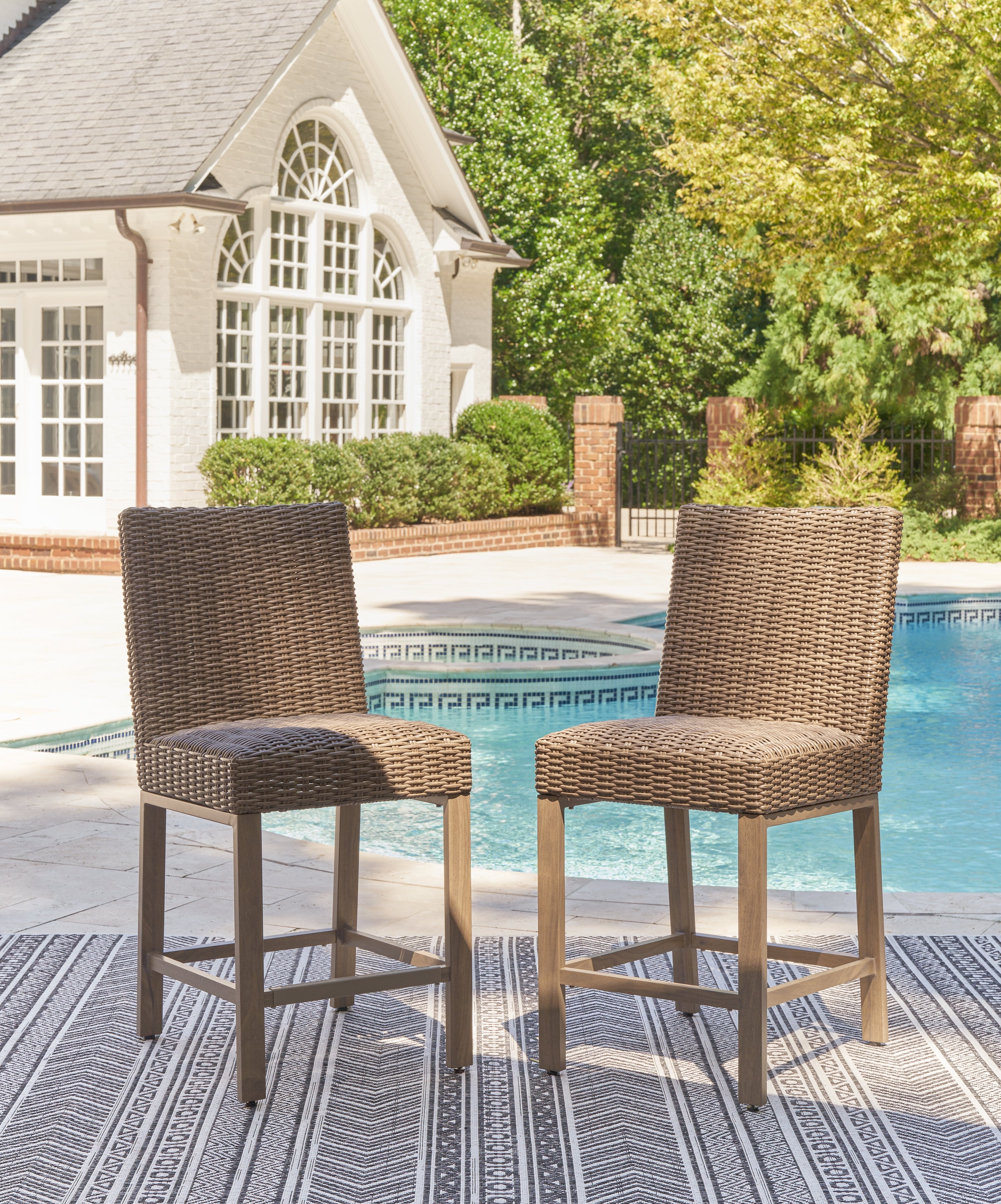 Warmstead Furniture - Ashley Furniture - Walton Bridge Outdoor - Barstool (Set of 2) / Driftwood - P749-130