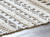 Warmstead Furniture - Ashley Furniture - Karalee Rug - 5' x 7' Rug / Ivory/Brown - R404442