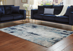Warmstead Furniture - Ashley Furniture - Leonelle Rug - 5'3" x 7'3" Rug / Cream/Blue/Gray - R404872