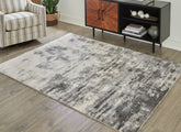 Warmstead Furniture - Ashley Furniture - Gerdie Rug - 7'10" x 10' Rug / Cream/Gray - R404991