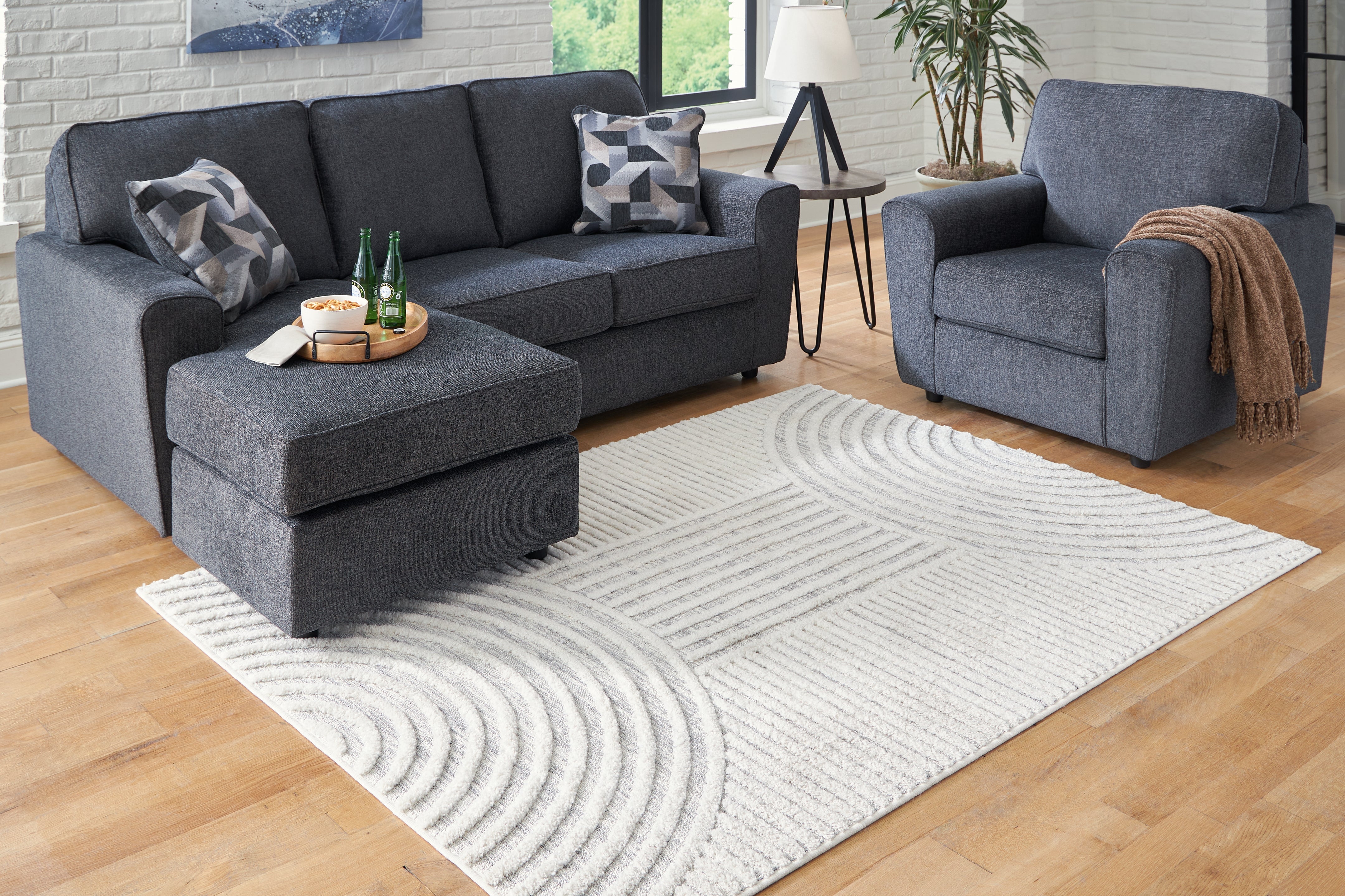 Warmstead Furniture - Ashley Furniture - Lambworth Rug - 5'3" x 7' Rug / Gray/Cream - R405342