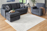 Warmstead Furniture - Ashley Furniture - Lambworth Rug - 5'3" x 7' Rug / Gray/Cream - R405342