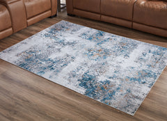 Warmstead Furniture - Ashley Furniture - Garyard Rug - 5' x 7' Washable Rug / Multi - R405772