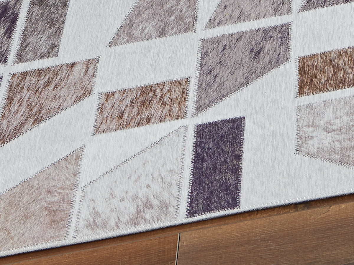 Warmstead Furniture - Ashley Furniture - Jettner Rug - 7'10" x 10' Rug / Multi - R405781