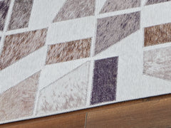 Warmstead Furniture - Ashley Furniture - Jettner Rug - 7'10" x 10' Rug / Multi - R405781