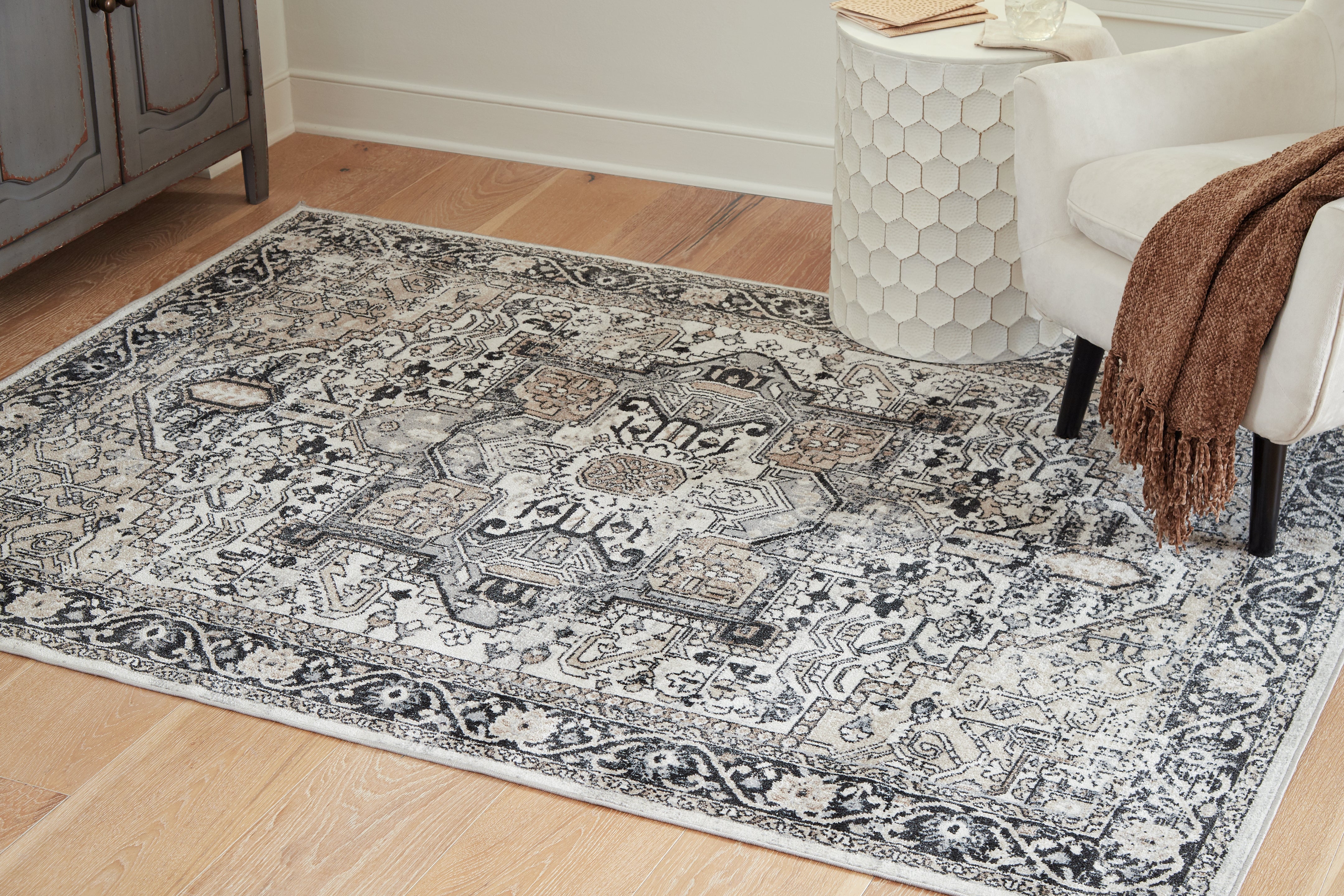 Warmstead Furniture - Ashley Furniture - Gregmoore Rug - 7'9" x 9'11" Washable Rug / Multi - R405821