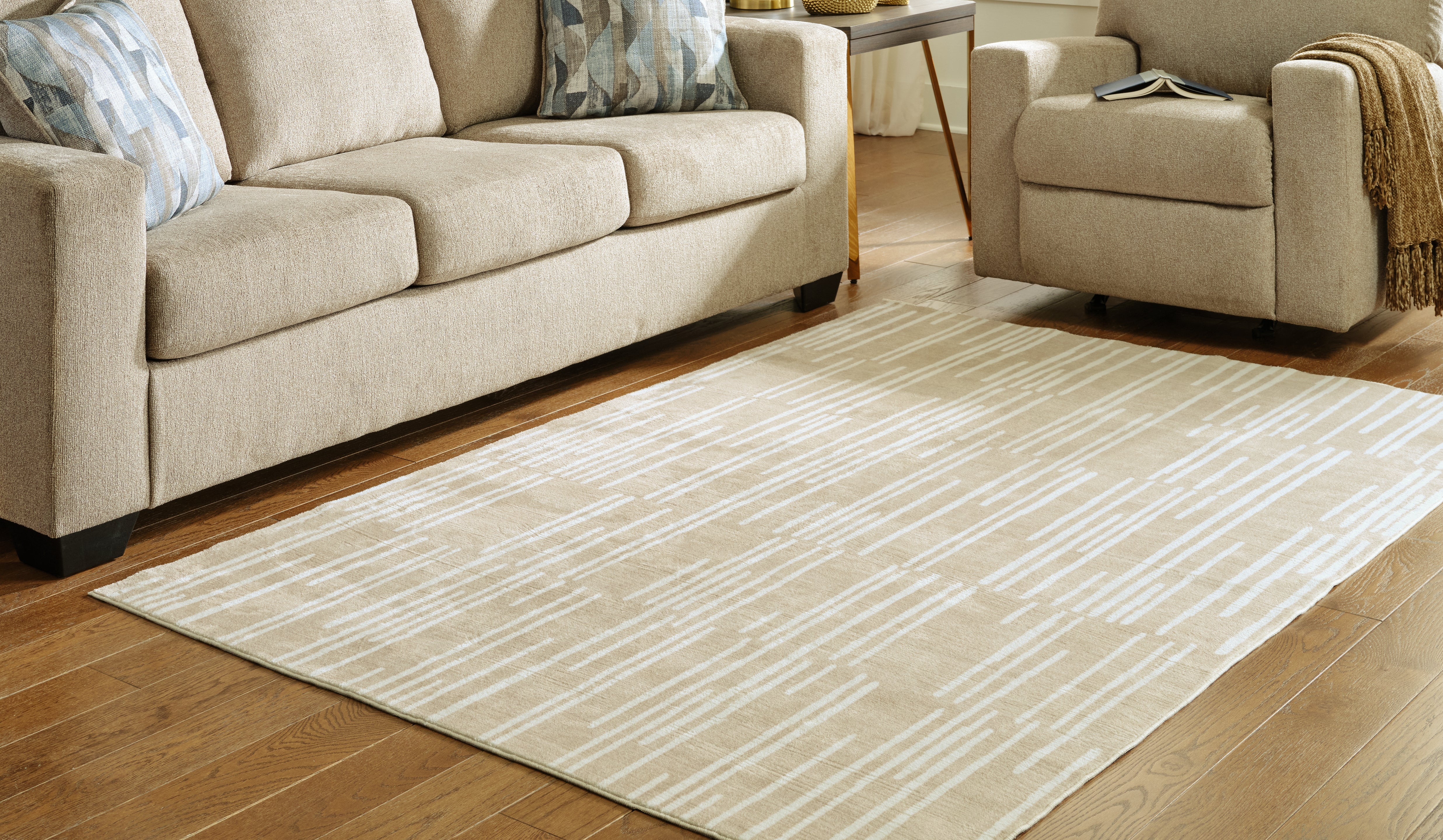 Warmstead Furniture - Ashley Furniture - Ardenville Rug - 5' x 7'1" Washable Rug / Tan/Cream - R406212