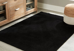 Warmstead Furniture - Ashley Furniture - Anaben Rug - 5' x 7' Washable Rug / Black - R406312