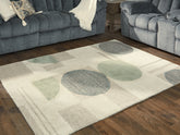 Warmstead Furniture - Ashley Furniture - Dallane Rug - 5' x 7' Rug / Linen/Blue/Green - R406352