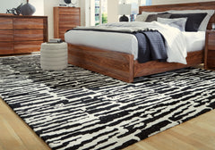 Warmstead Furniture - Ashley Furniture - Bramshaw Rug - 10' x 14' Rug / Black/Ivory - R406760