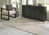 Warmstead Furniture - Ashley Furniture - Jadott Rug - 5' x 7' Rug / Beige/Brown - R406802