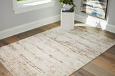 Warmstead Furniture - Ashley Furniture - Kasney Rug - 8' x 10' Rug / Cream/Brown - R406851