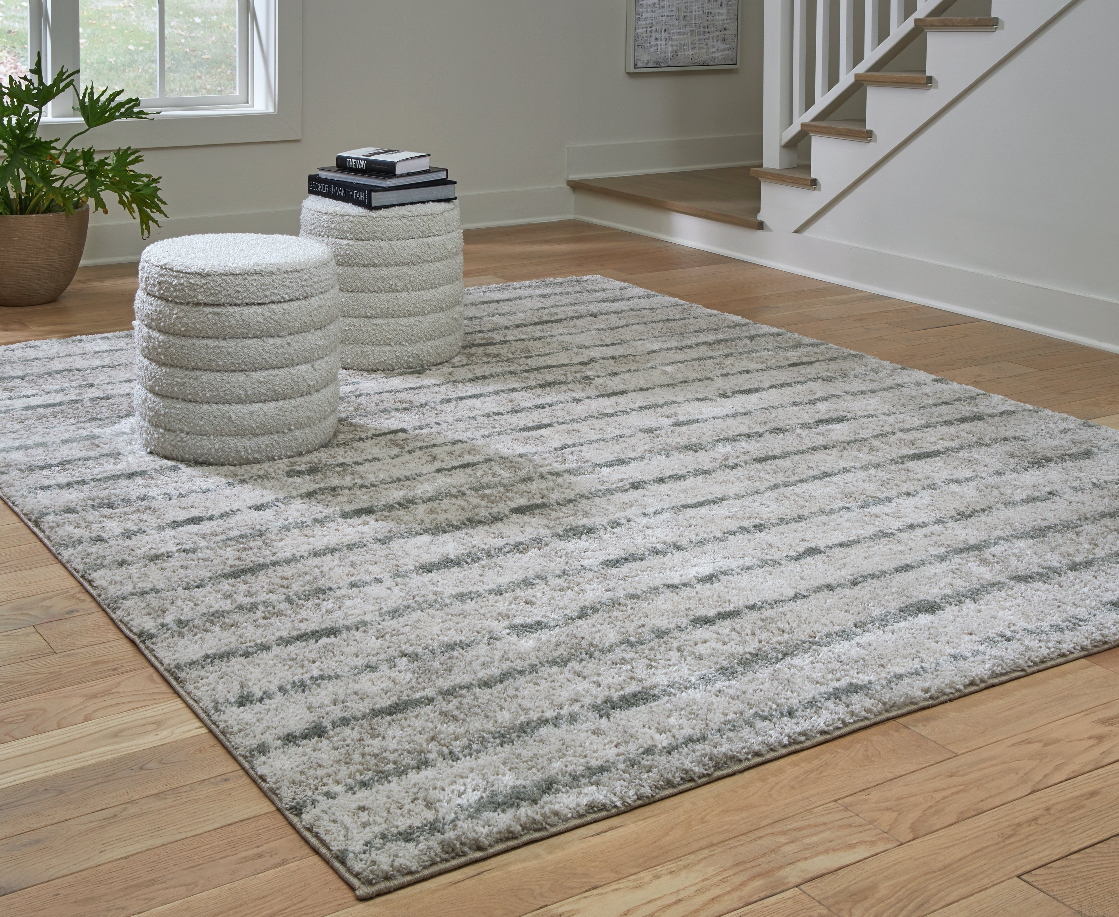 Warmstead Furniture - Ashley Furniture - Laddway Rug - 5' x 7' Rug / Cream/Green - R406882