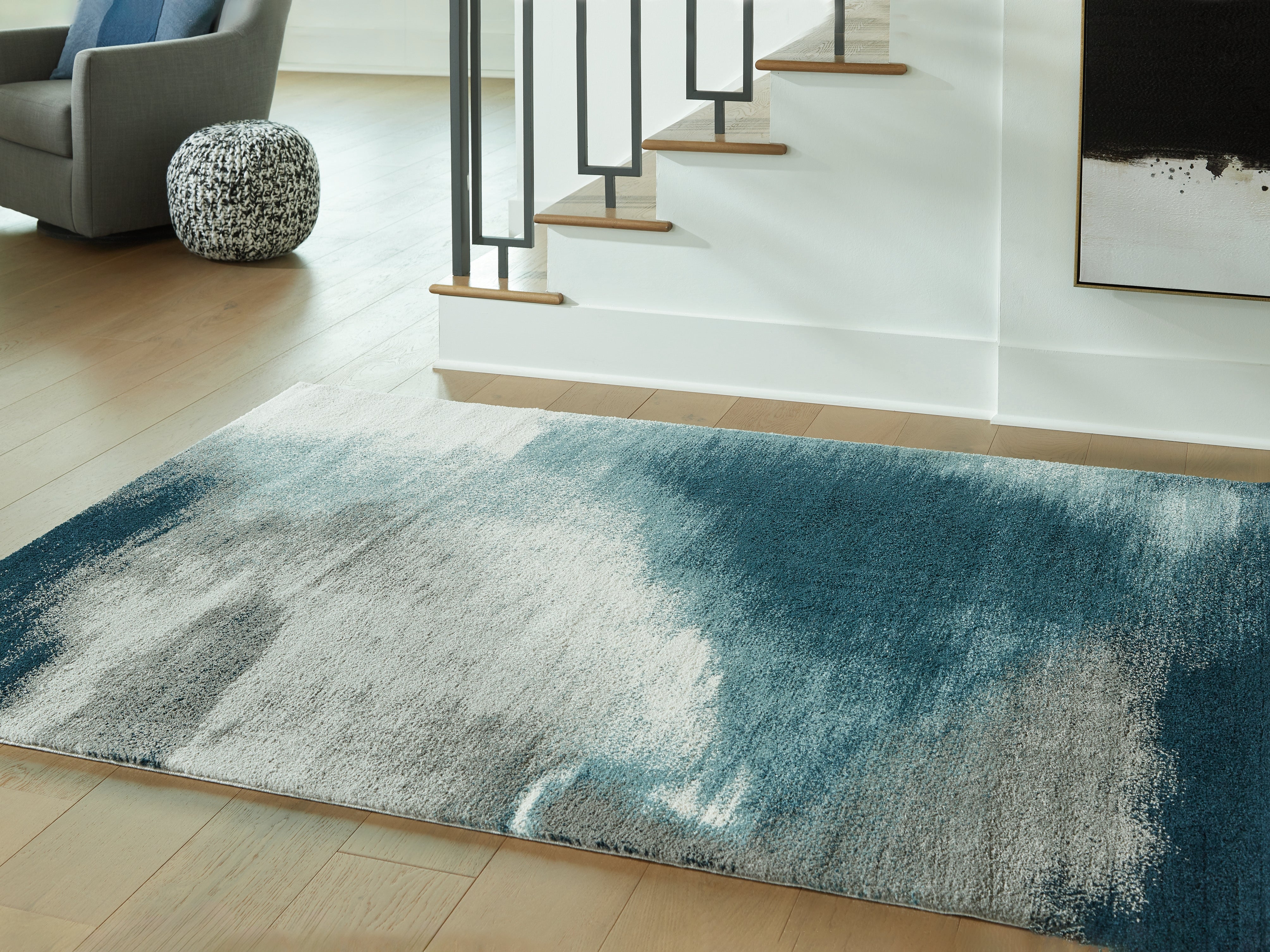 Warmstead Furniture - Ashley Furniture - Brentward Rug - 5' x 7' Rug / Blue/Gray/Ivory - R407082