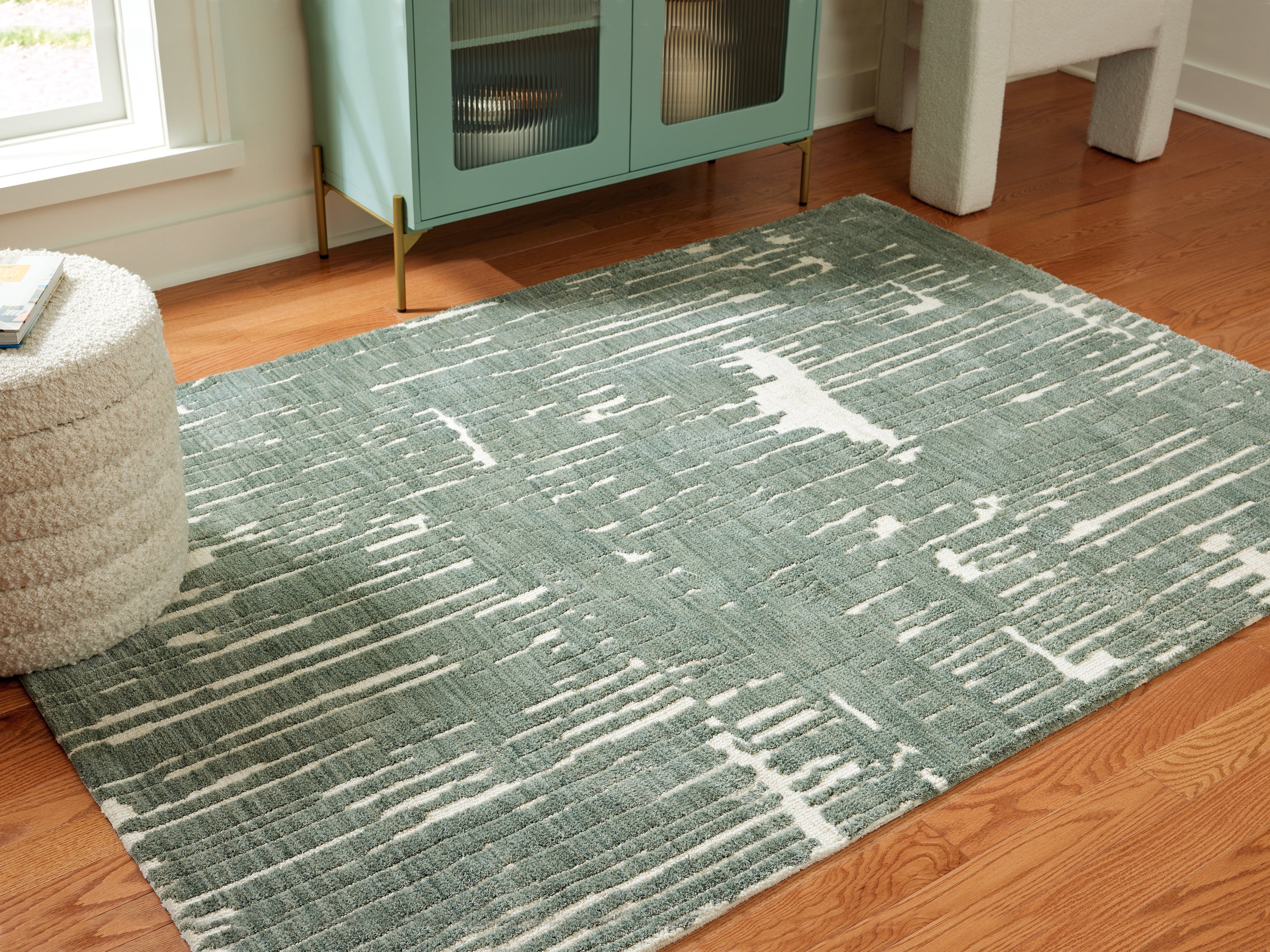 Warmstead Furniture - Ashley Furniture - Cayworth Rug - 5' x 7' Rug / Teal/White - R407092