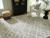 Warmstead Furniture - Ashley Furniture - Unawick Rug - Medium Rug / Gray/Ivory - R407332