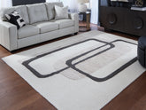 Warmstead Furniture - Ashley Furniture - Davismour Rug - 7'8" x 10' Area Rug / Ivory/Taupe/Charcoal - R407561
