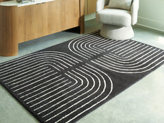 Warmstead Furniture - Ashley Furniture - Eldonmore Rug - 7'8" x 10' Area Rug / Black/Ivory - R407571