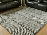 Warmstead Furniture - Ashley Furniture - Kurtmen Rug - 7'10" x 9'10" Area Rug / Black/Ivory - R407591
