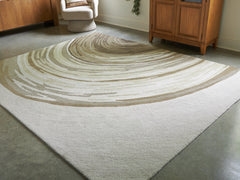 Warmstead Furniture - Ashley Furniture - Rizwana Rug - 7'6" x 10' Area Rug / Ivory/Brown/Gray - R407761