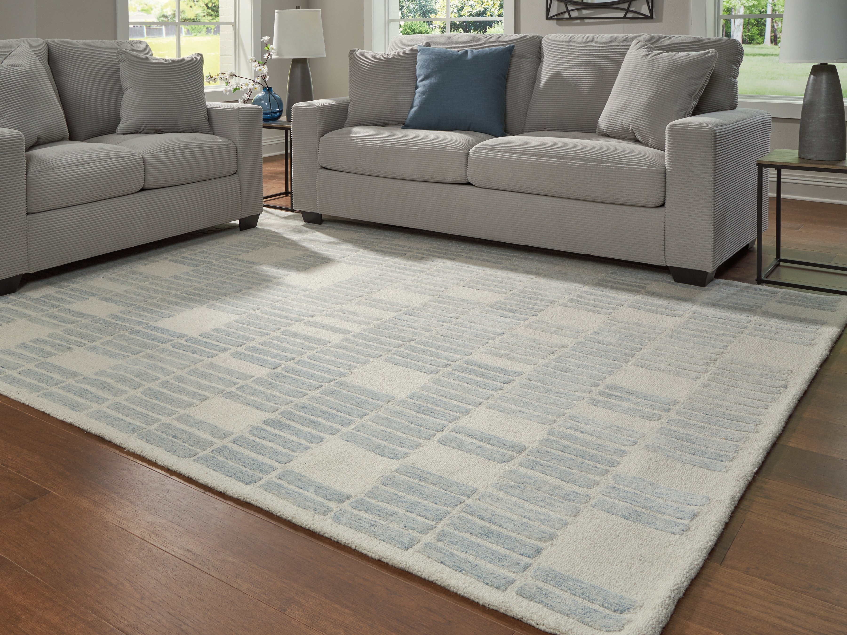 Warmstead Furniture - Ashley Furniture - Dylanton Rug - 7'8" x 10' Area Rug / Ivory/Blue - R407811