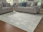 Warmstead Furniture - Ashley Furniture - Dylanton Rug - 7'8" x 10' Area Rug / Ivory/Blue - R407811