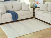 Warmstead Furniture - Ashley Furniture - Genemost Rug - 5' x 7' Area Rug / Ivory/Blue - R407842