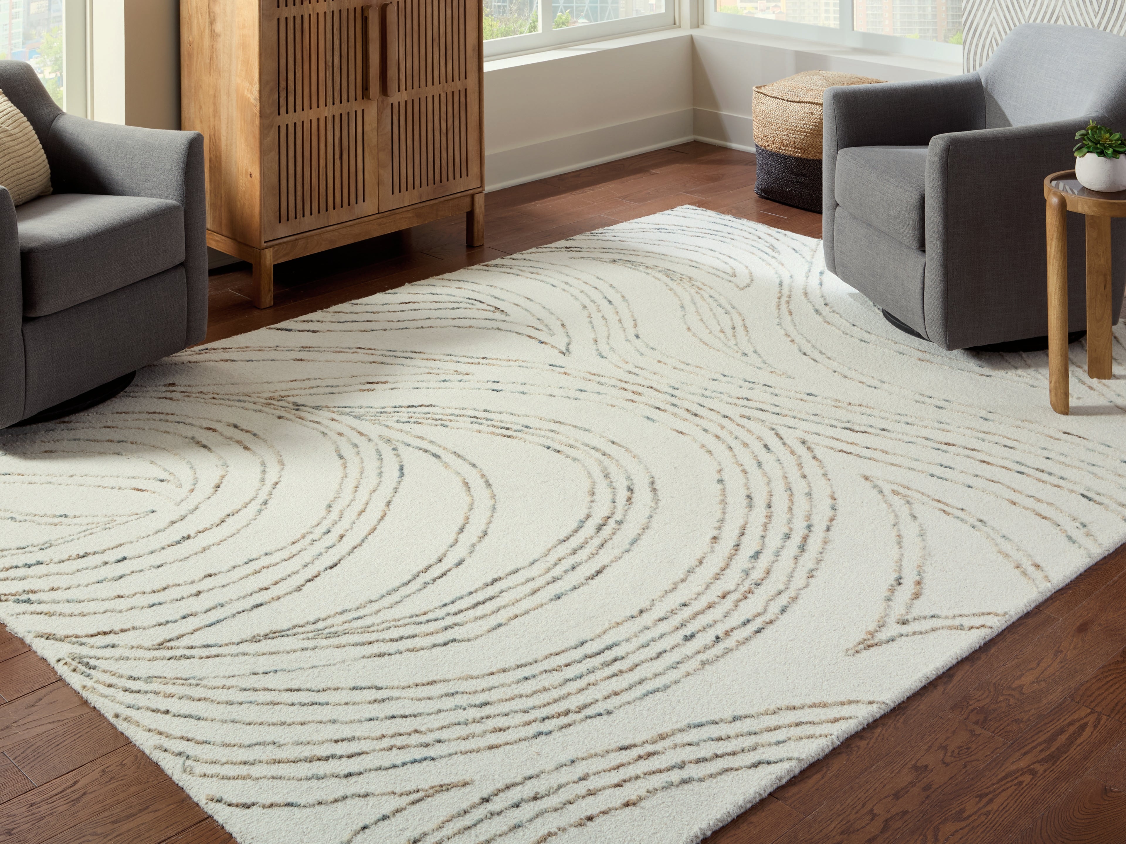 Warmstead Furniture - Ashley Furniture - Deenbury Rug - 7'8" x 10' Area Rug / Ivory/Green/Brown - R407861