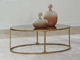 Warmstead Furniture - Ashley Furniture - Korajane Coffee Table - Oval Cocktail Table / Antique Gold - T399-0