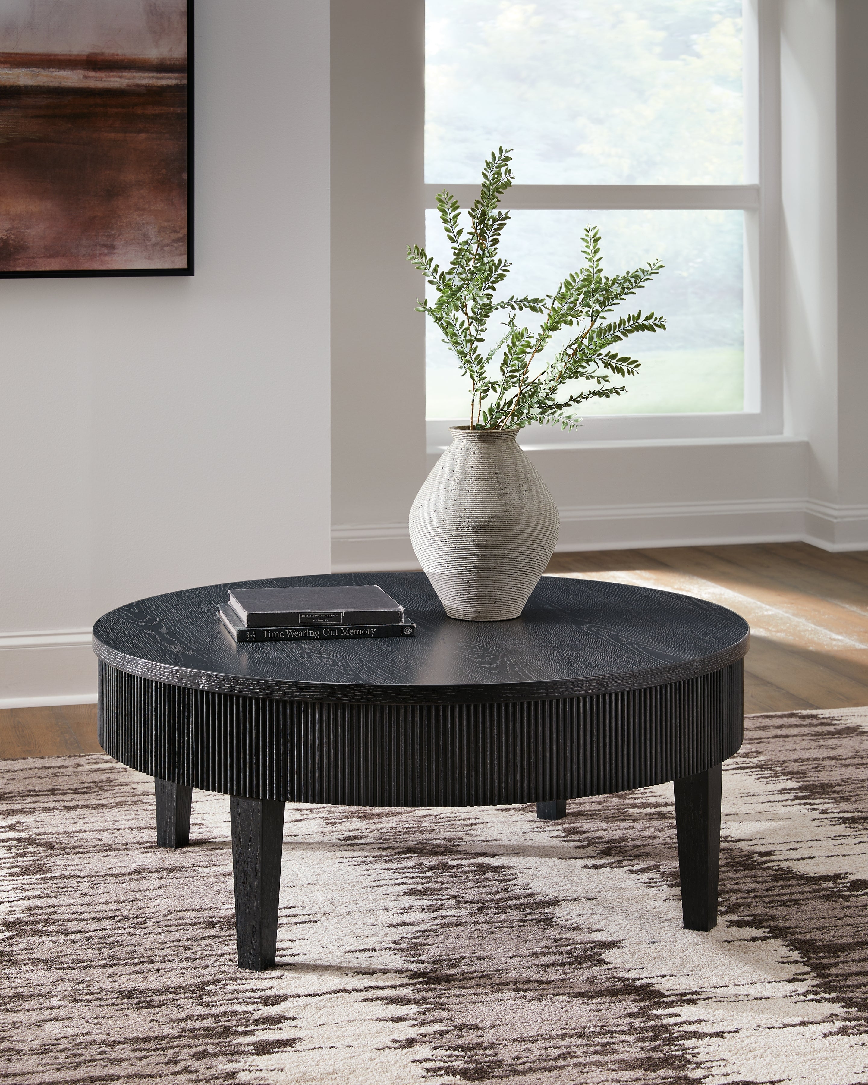 Warmstead Furniture - Ashley Furniture - Marstream Coffee Table - Round Cocktail Table / Black - T551-8