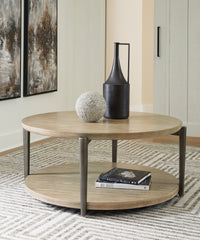 Warmstead Furniture - Ashley Furniture - Dyonton Coffee Table - Round Cocktail Table / Light Grayish Brown - T574-8