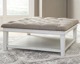 Warmstead Furniture - Ashley Furniture - Kanwyn Upholstered Ottoman Coffee Table - UPH Ottoman Cocktail Table / Whitewash - T937-21