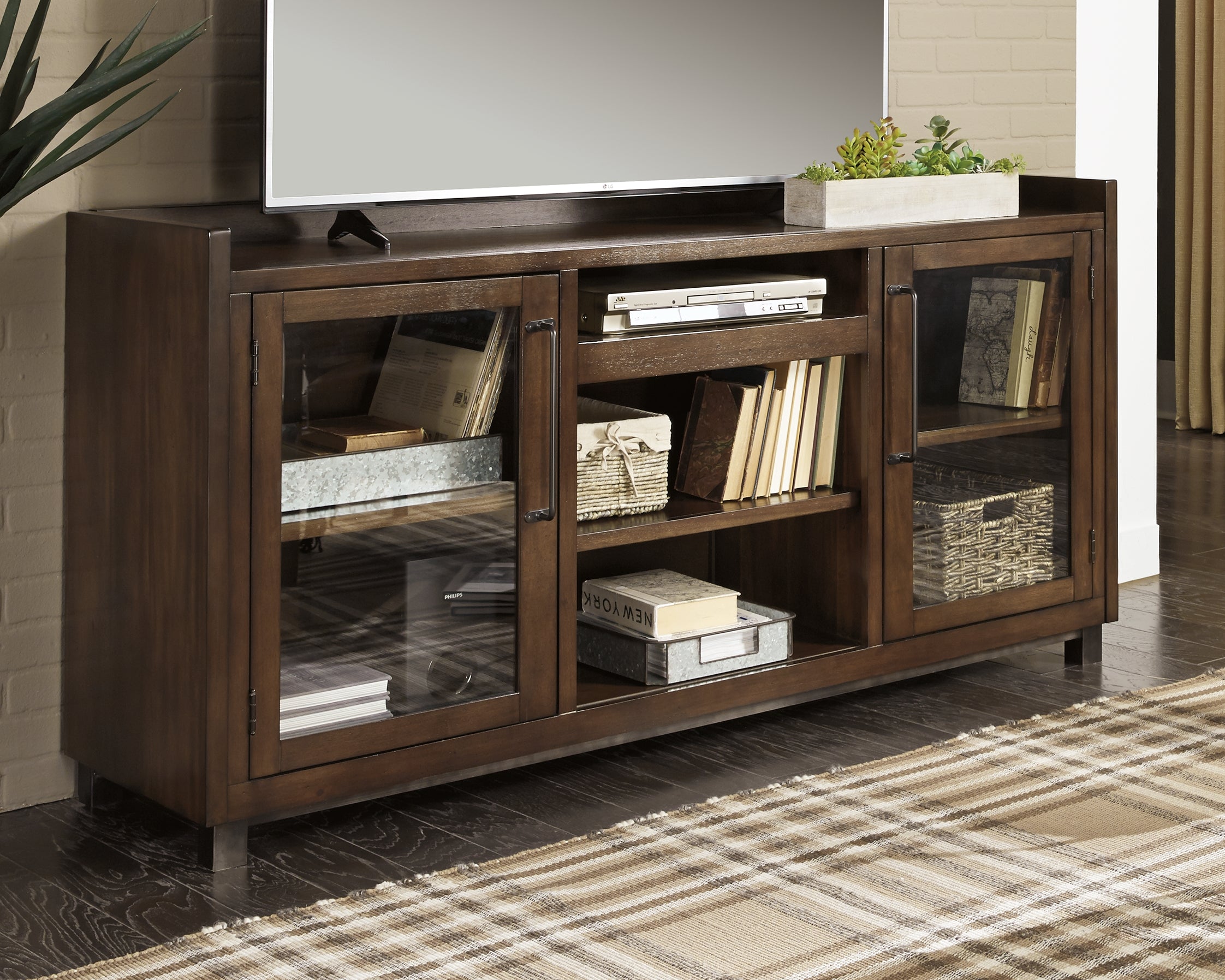Warmstead Furniture - Ashley Furniture - Starmore 70" TV Stand - 70" / Brown - W633-68