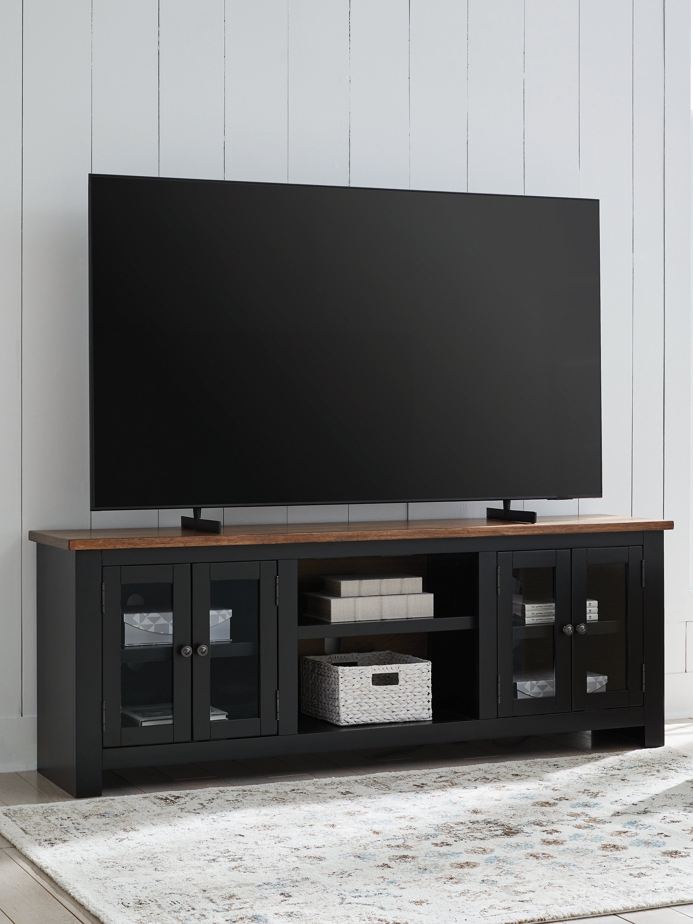 Warmstead Furniture - Ashley Furniture - Wildenauer 76" TV Stand - 76" / Brown/Black - W664-68