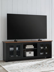 Warmstead Furniture - Ashley Furniture - Wildenauer 76" TV Stand - 76" / Brown/Black - W664-68