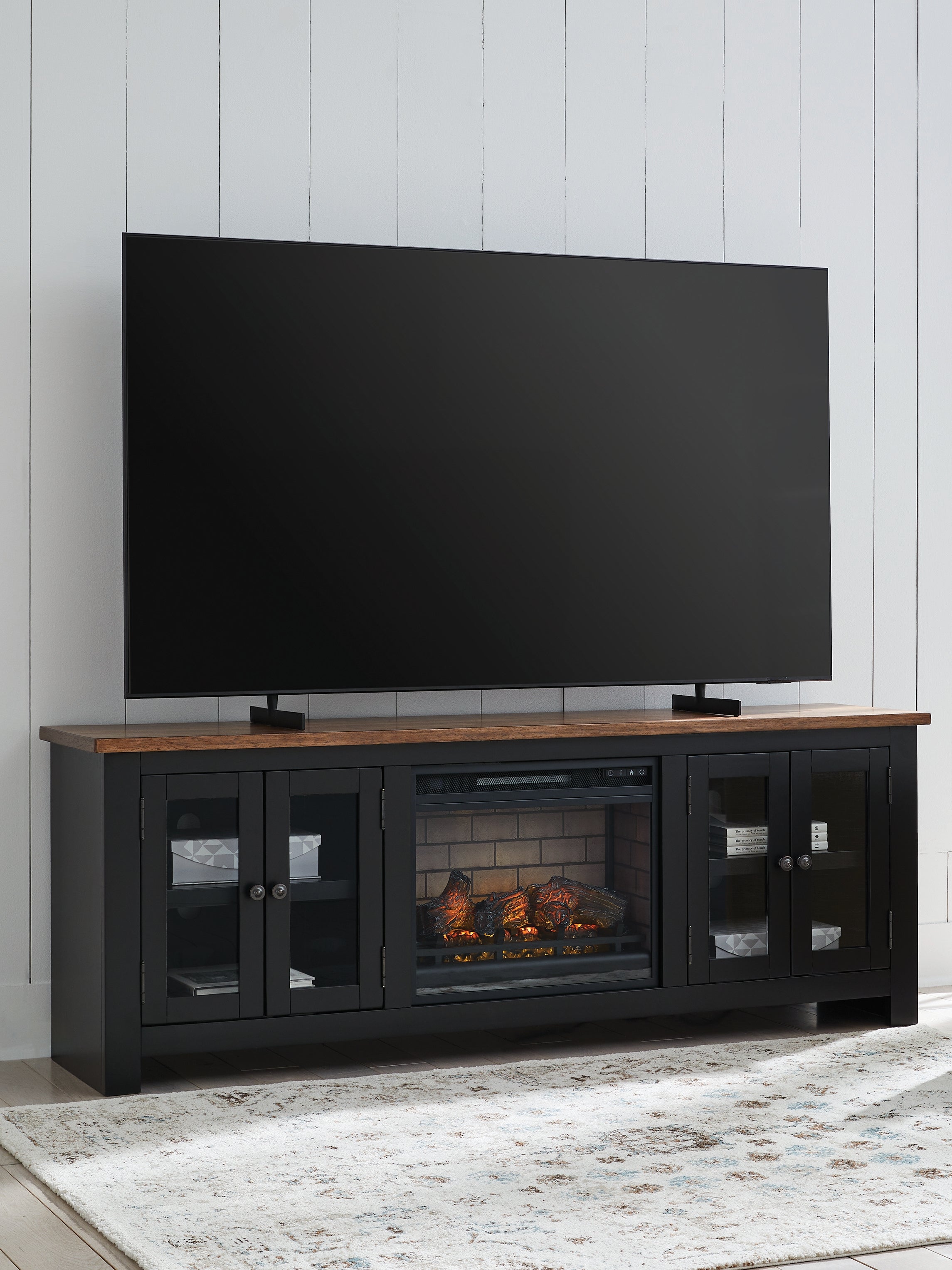 Warmstead Furniture - Ashley Furniture - Wildenauer 76" TV Stand with Electric Fireplace - 76" TV Stand with Electric Fireplace / Brown/Black - W664W1