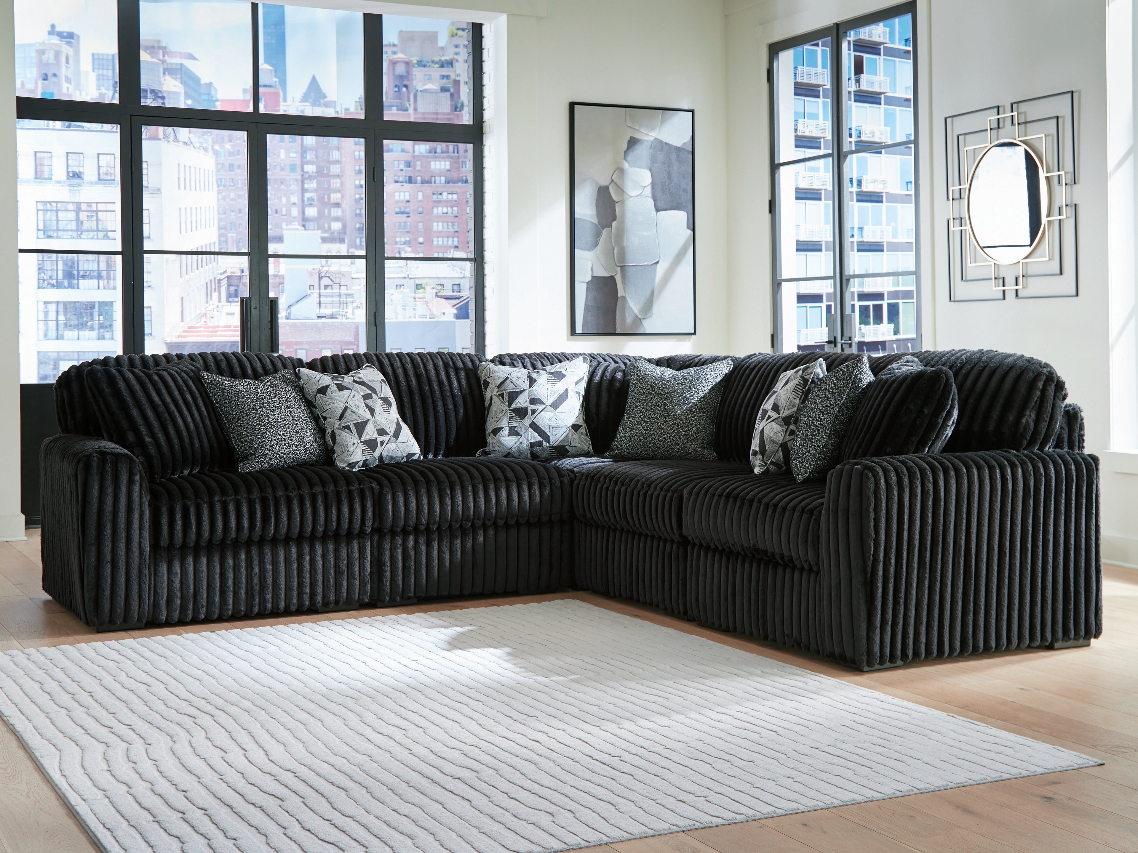 Warmstead Furniture - Ashley Furniture - Midnight-Madness Sectional - RAF 5-Piece Sectional / Onyx - 98103S26