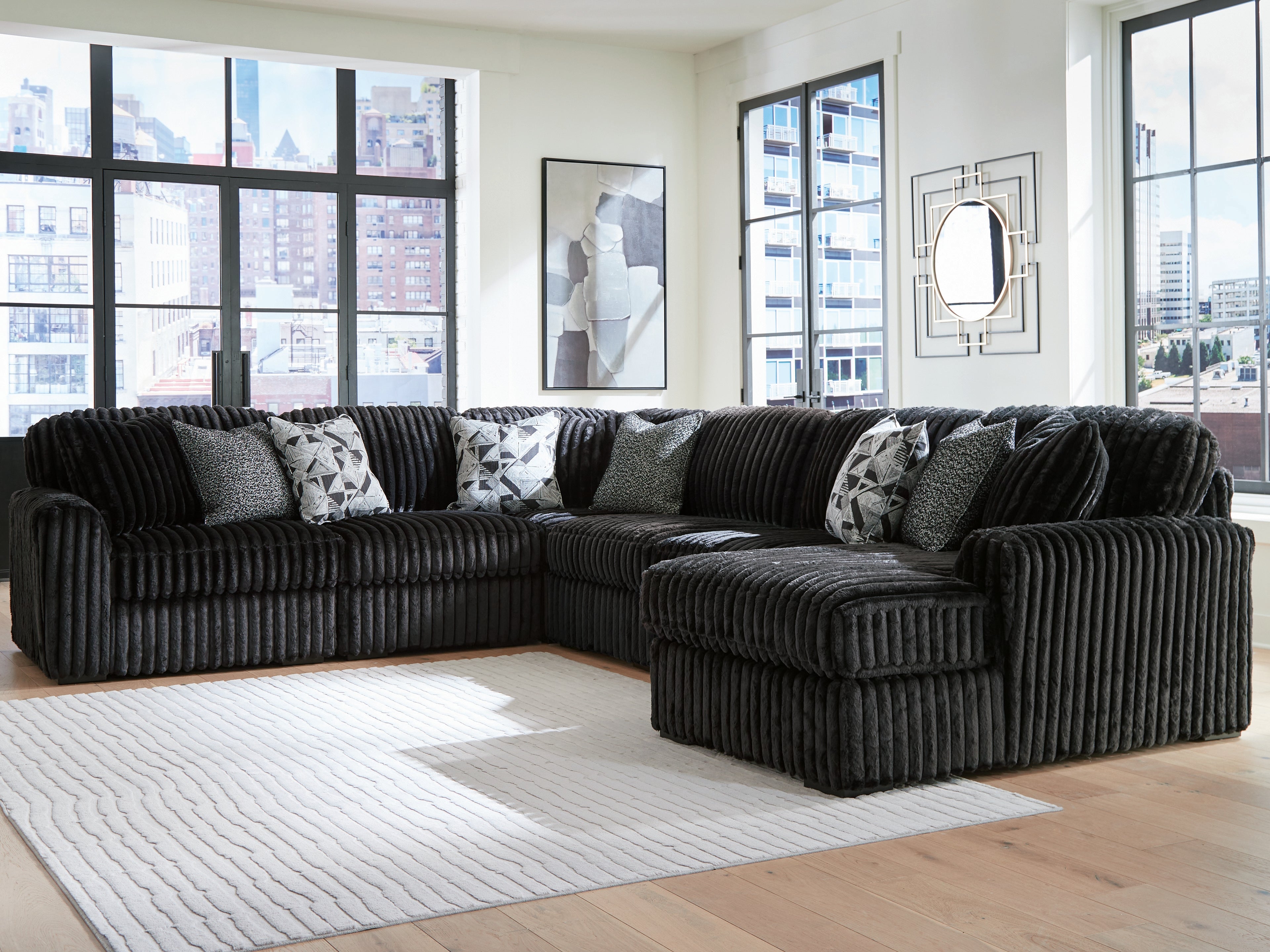Warmstead Furniture - Ashley Furniture - Midnight-Madness Sectional - RAF 6-Piece Sectional with Chaise / Onyx - 98103S24