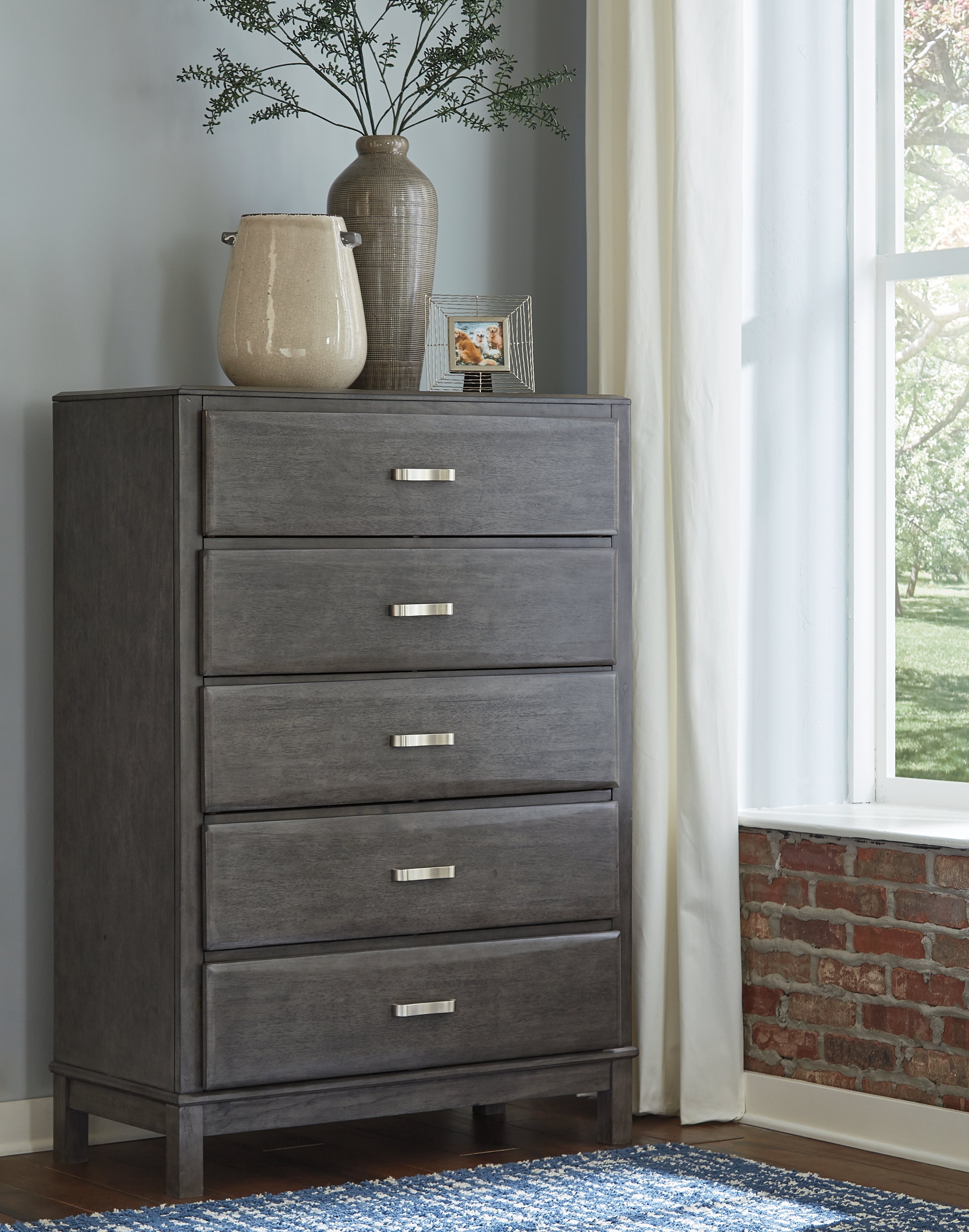 Warmstead Furniture - Ashley Furniture - Caitbrook Bedroom - Five Drawer Chest / Gray - B476-46