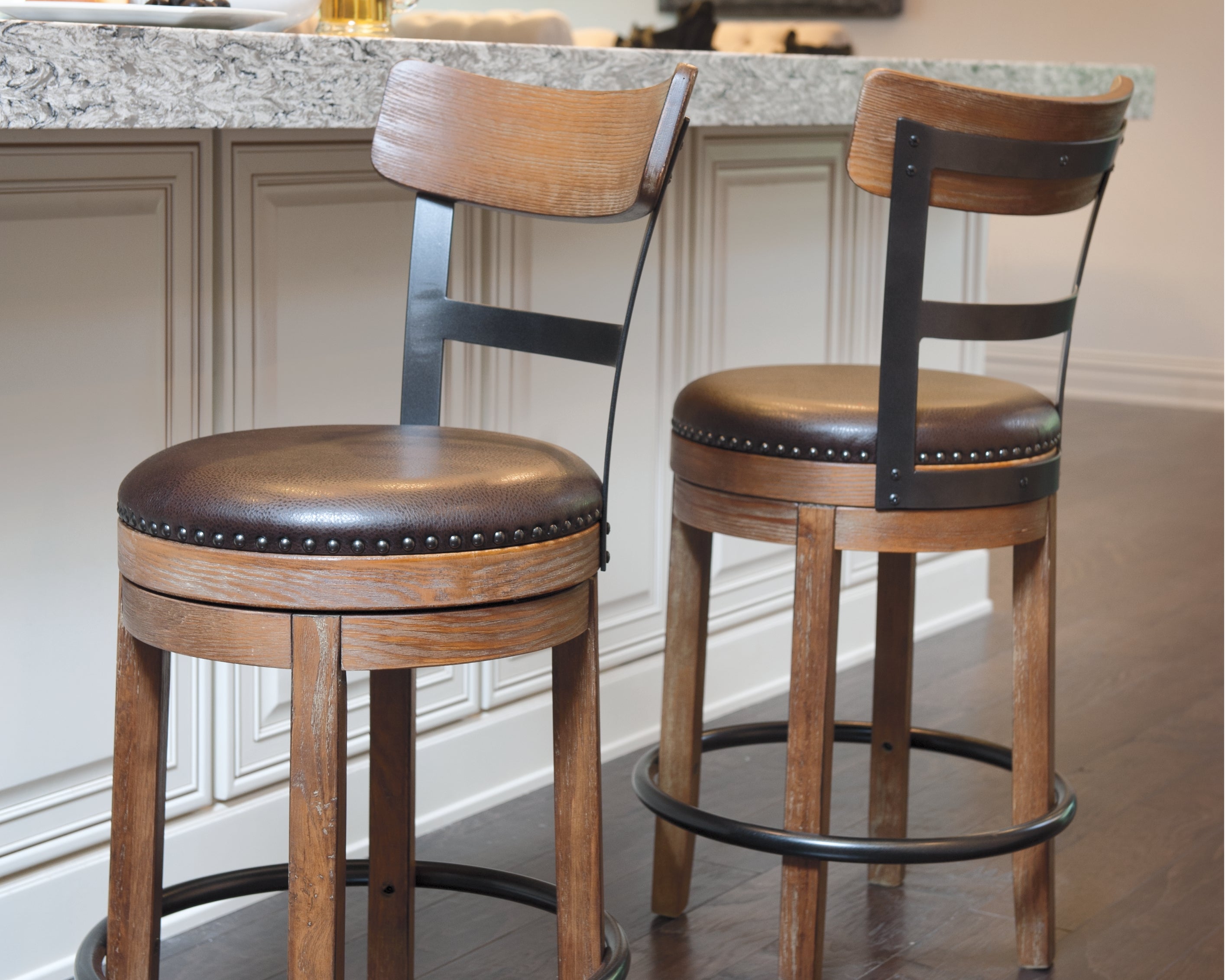 Warmstead Furniture - Ashley Furniture - Pinnadel Dining Room - Counter Height Bar Stool (Set of 2) / Grayish Brown - D542-124X2