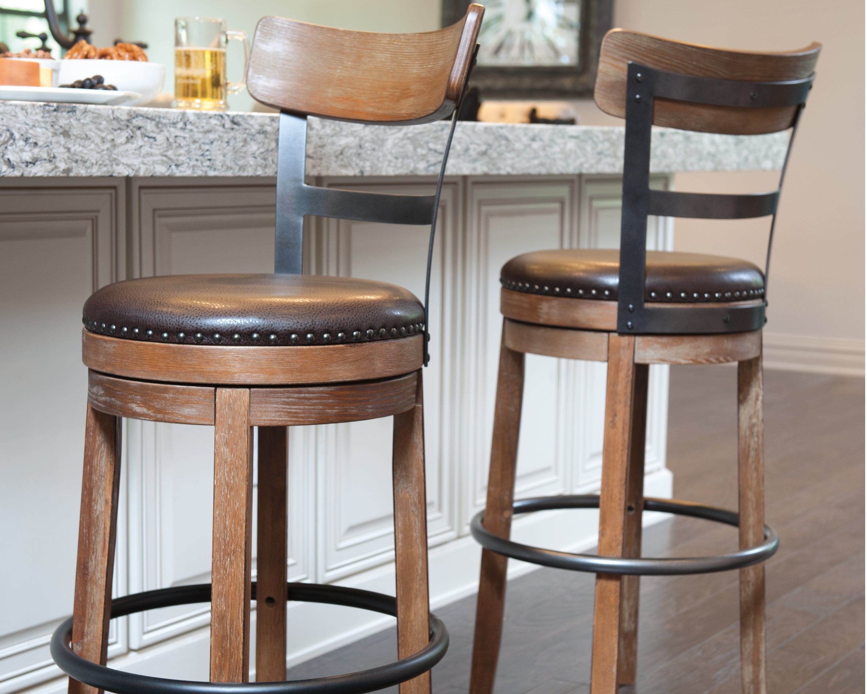 Warmstead Furniture - Ashley Furniture - Pinnadel Dining Room - Bar Height Bar Stool (Set of 2) / Grayish Brown - D542-130X2