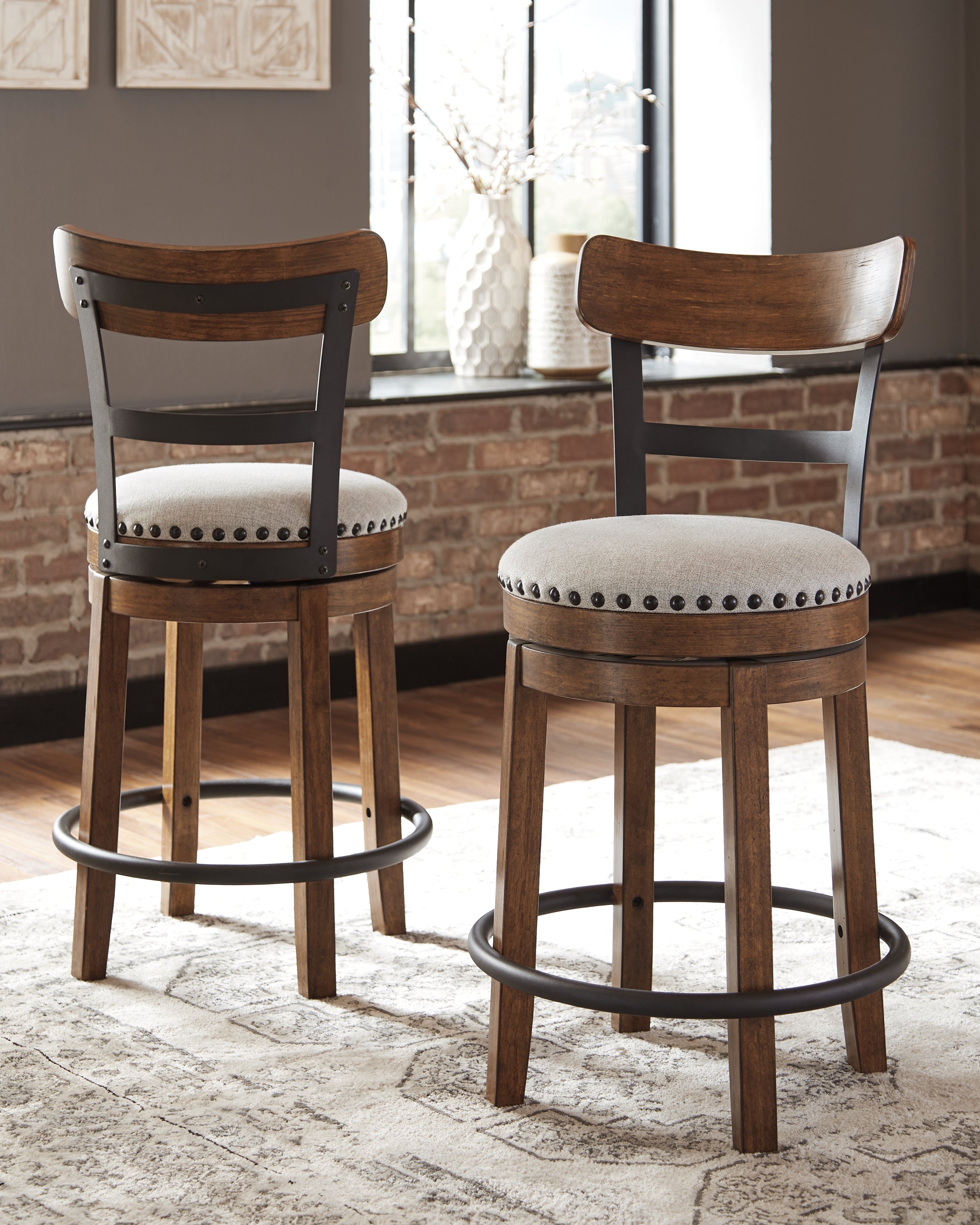 Warmstead Furniture - Ashley Furniture - Valebeck Dining Room - UPH Swivel Barstool (1/CN) / Brown - D546-424