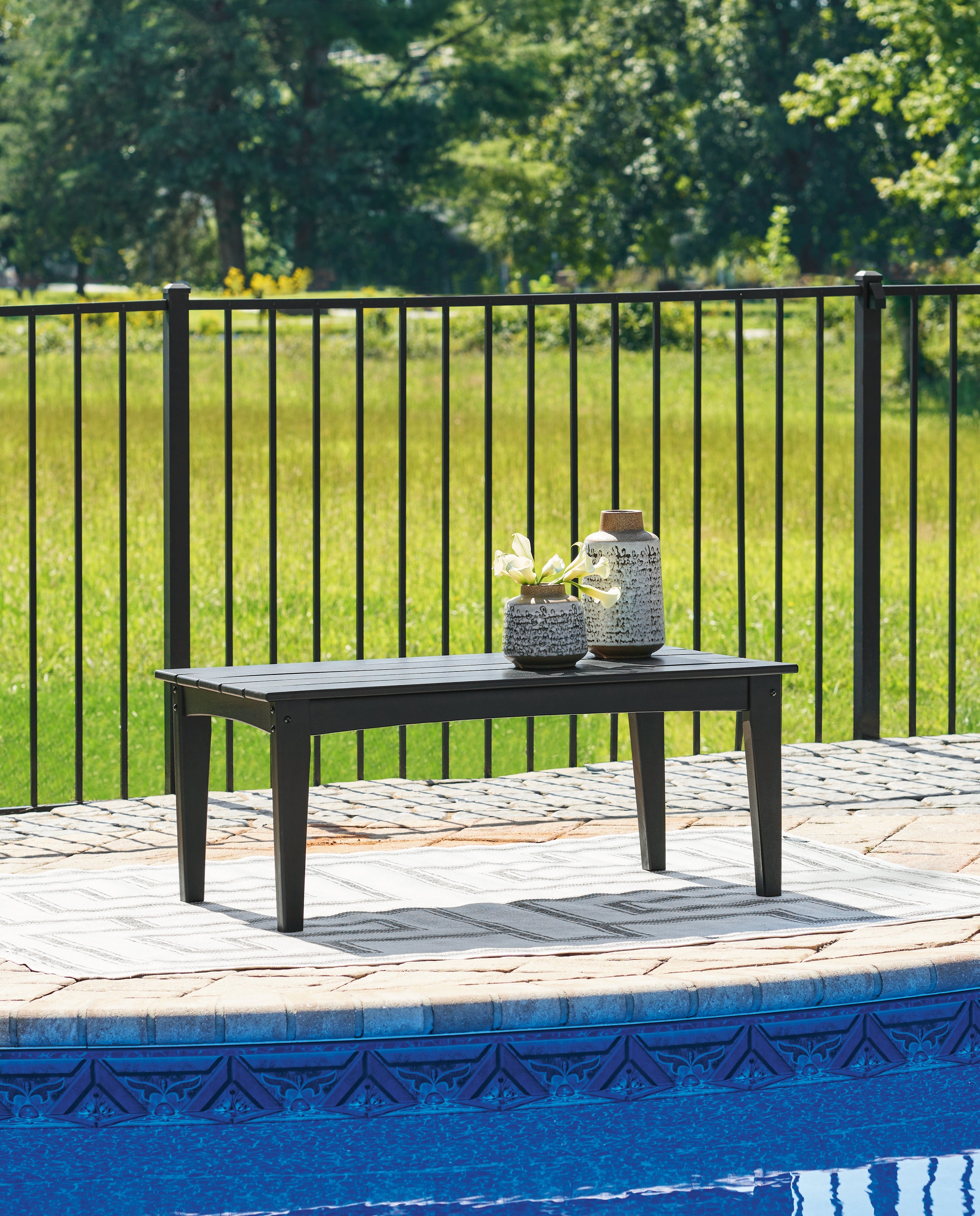Warmstead Furniture - Ashley Furniture - Hyland wave Outdoor - Rectangular Cocktail Table / Black - P108-701