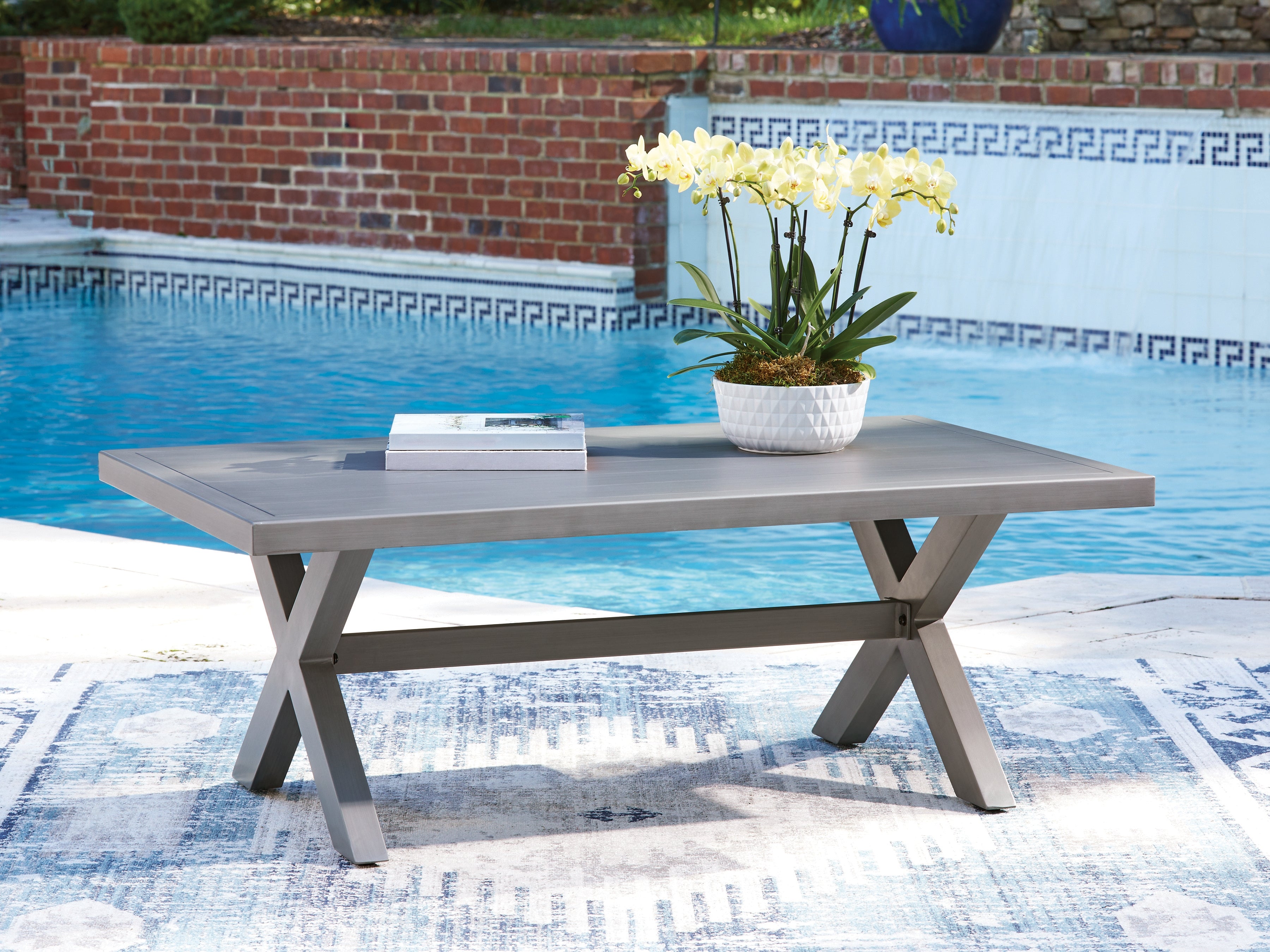 Warmstead Furniture - Ashley Furniture - Half Moon Beach Outdoor - Rectangular Cocktail Table / Gray - PCP418-701
