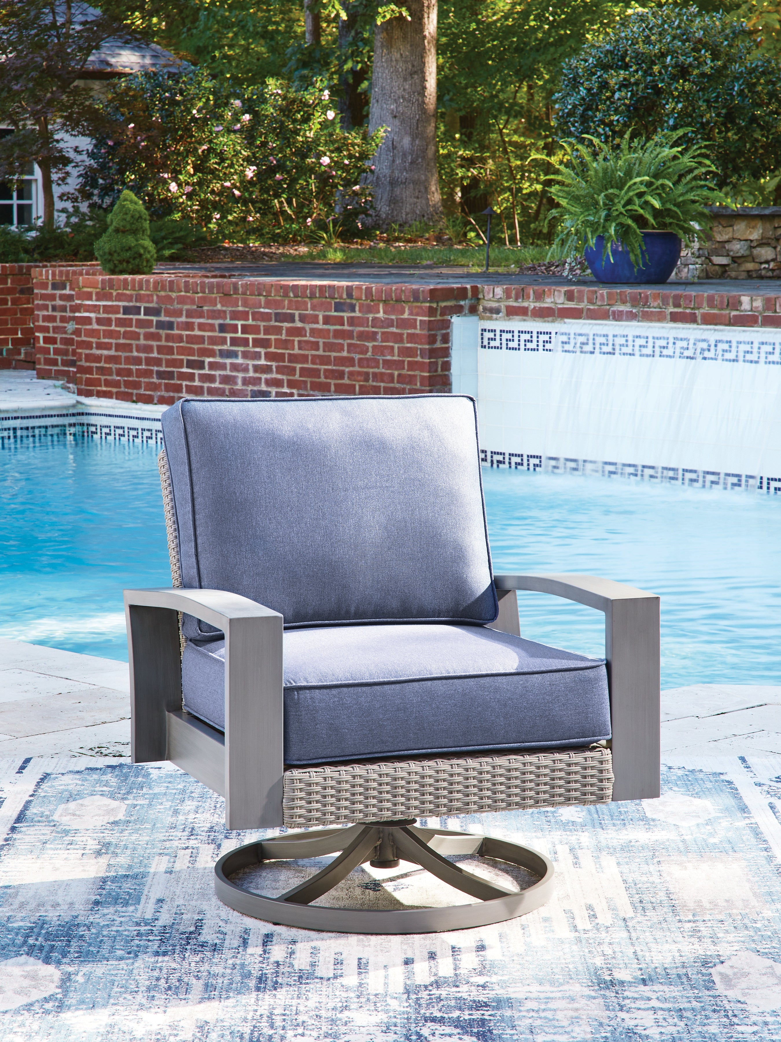 Warmstead Furniture - Ashley Furniture - Half Moon Beach Outdoor - Swivel Lounge w/ Cushion / Blue/Gray - PCP418-821